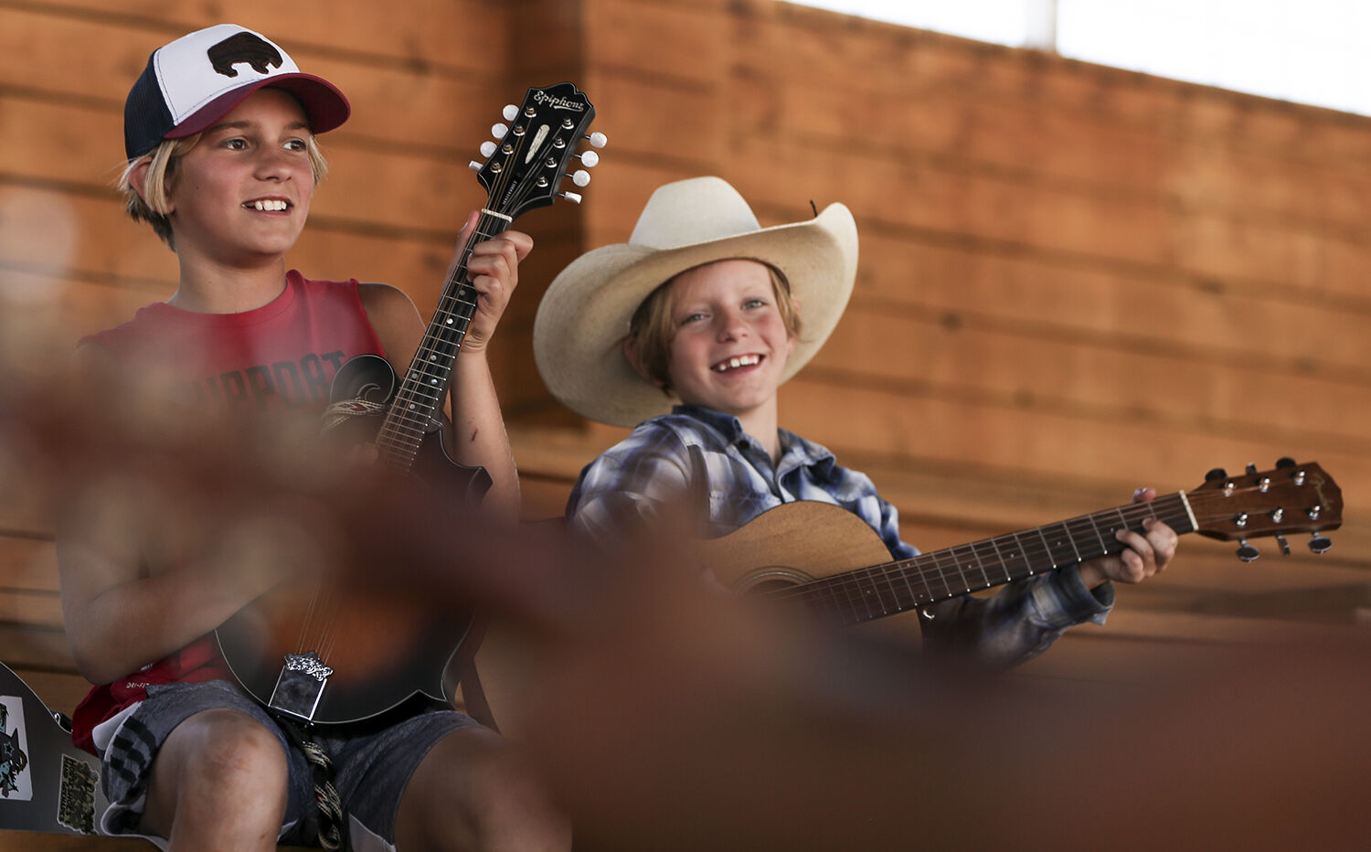 Jonah Roback, 11, and Stuhrling Osborne, 8, laugh as they practice the muppets